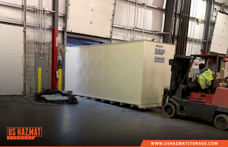 Installing a new flammable storage storage building with forklift in Food Production factory facilities.