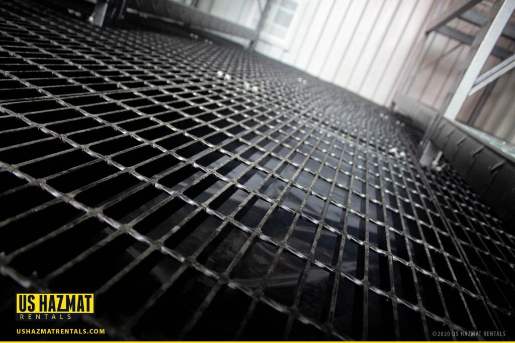 Welded containment sump floor inside a chemical storage building